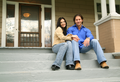 Young Couple With New House